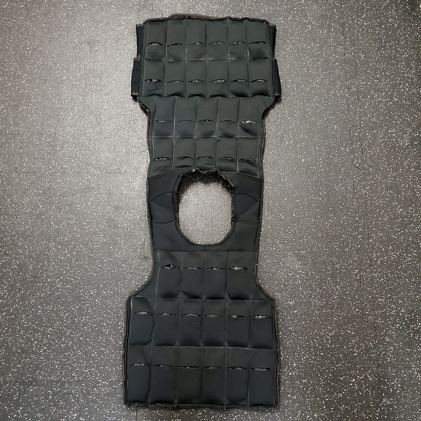 White Lion Athletics 10kg adjustable weighted vest shot from the inside to display where the individual weights are placed.