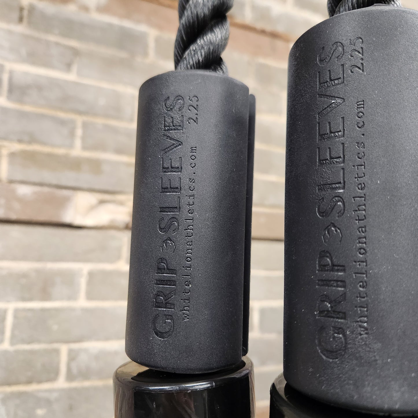 2.25" Grip Sleeves by White Lion Athletics being used on triceps extension rope attachment