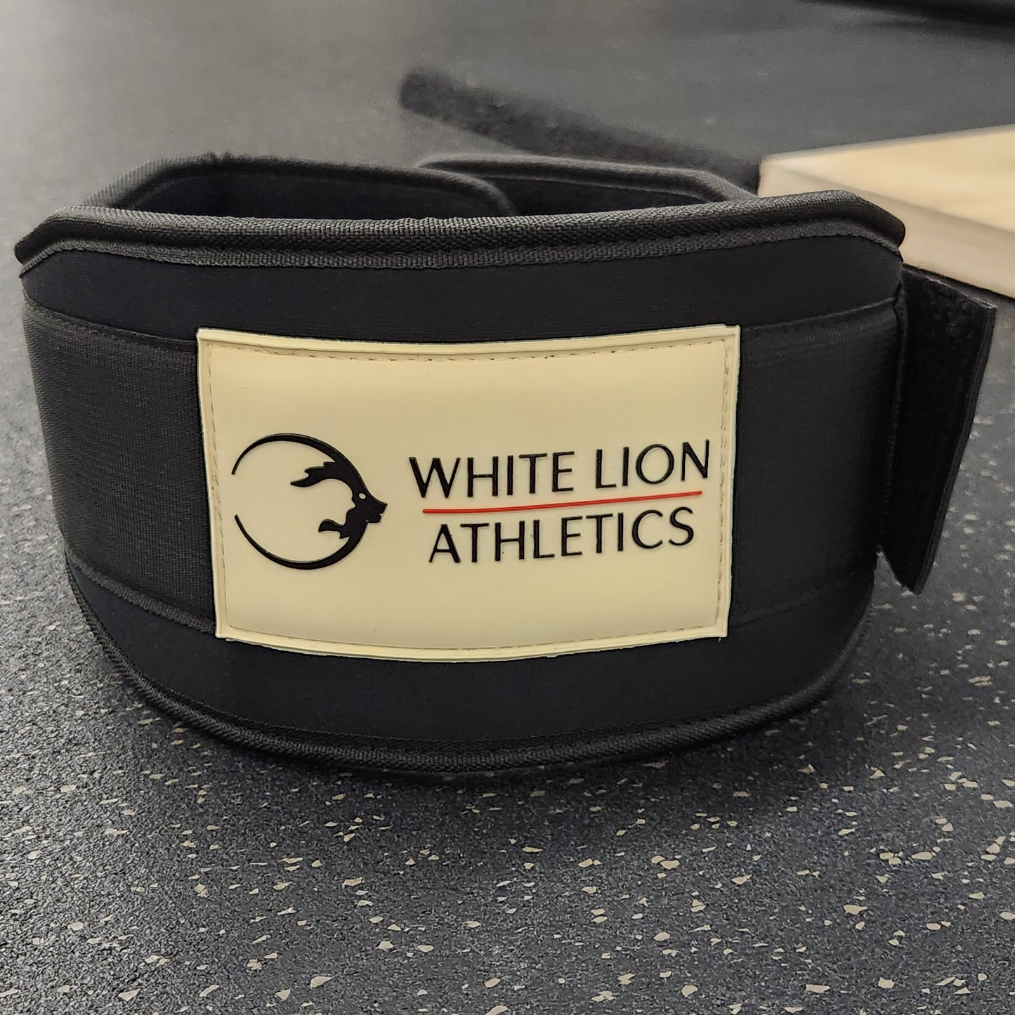 Weightlifting Belt | BLK MAX  5" Nylon Lifting Belt -by White Lion Athletics on a black gym floor.