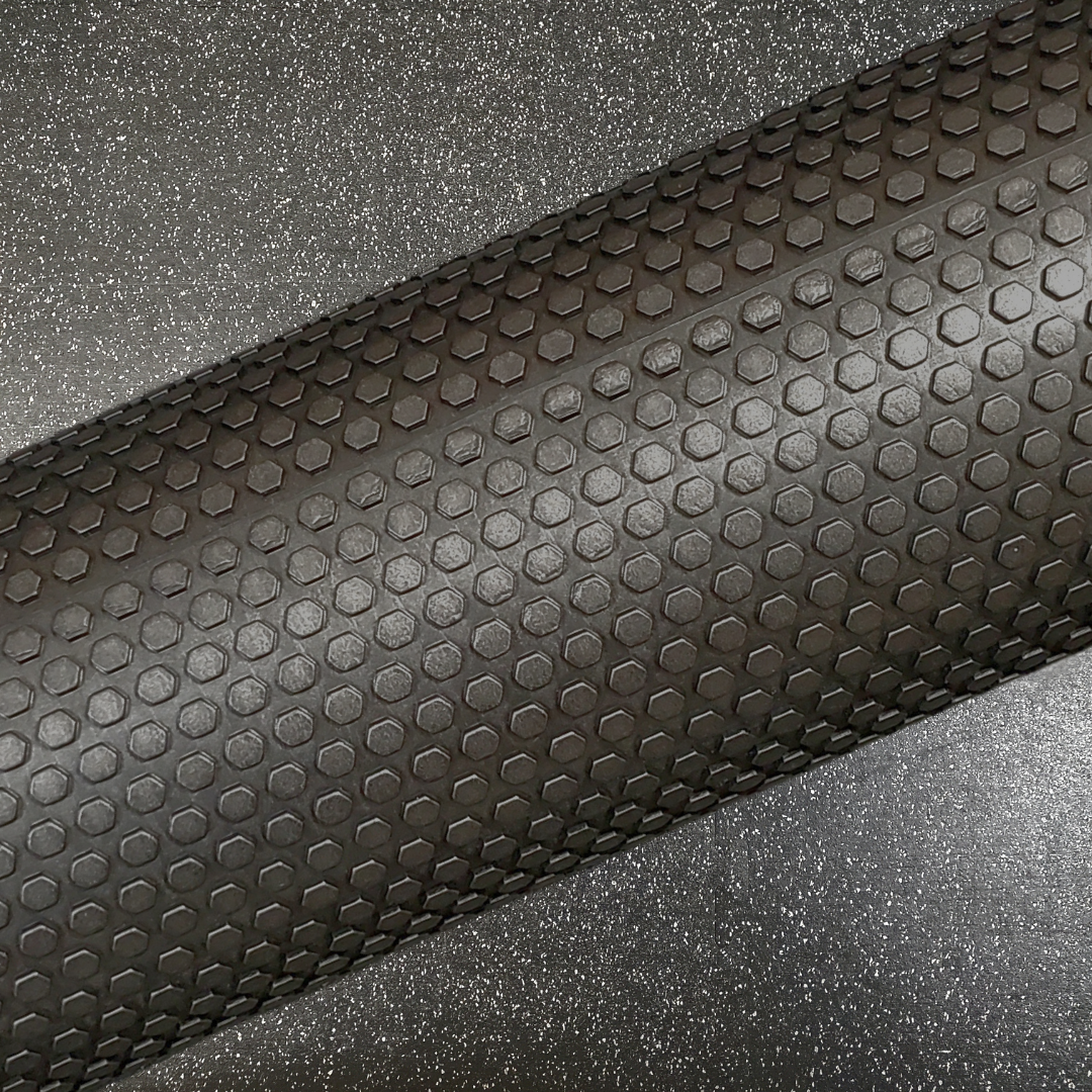 Close-up shot of the grid pattern on the 18" High Density EVA Foam Roller by White Lion Athletics