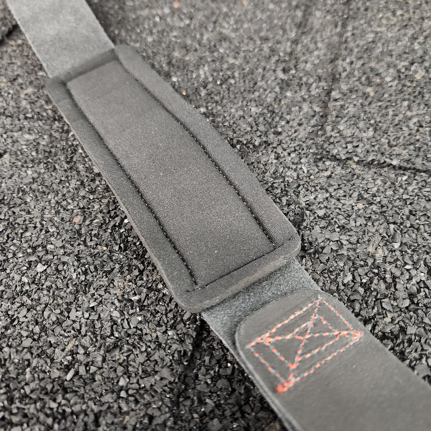 Close up shot of neoprene padding on the inside of White Lion Athletics leather weightlifting straps.