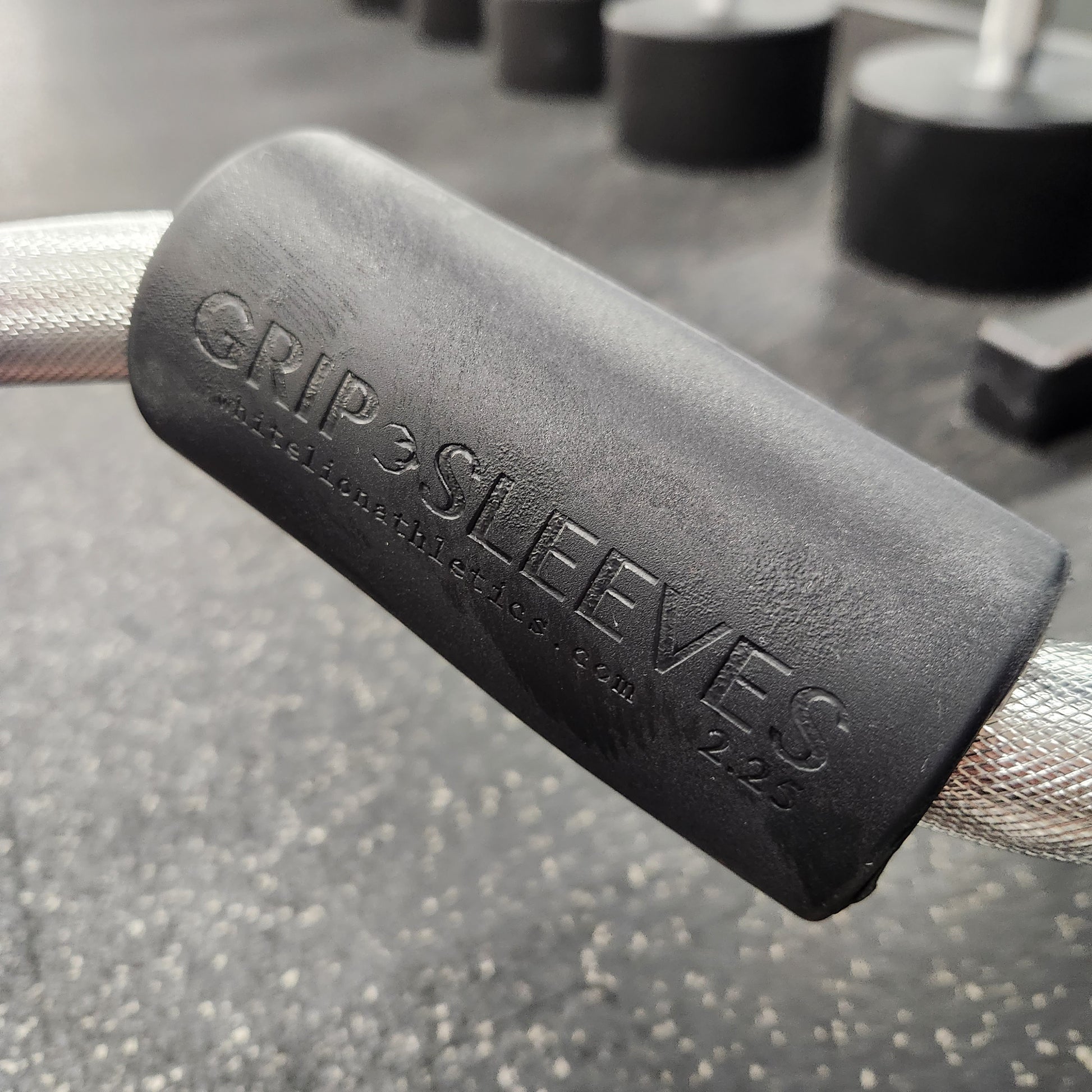 2.25" Grip Sleeves by White Lion Athletics being used on Ez-Curl  barbell