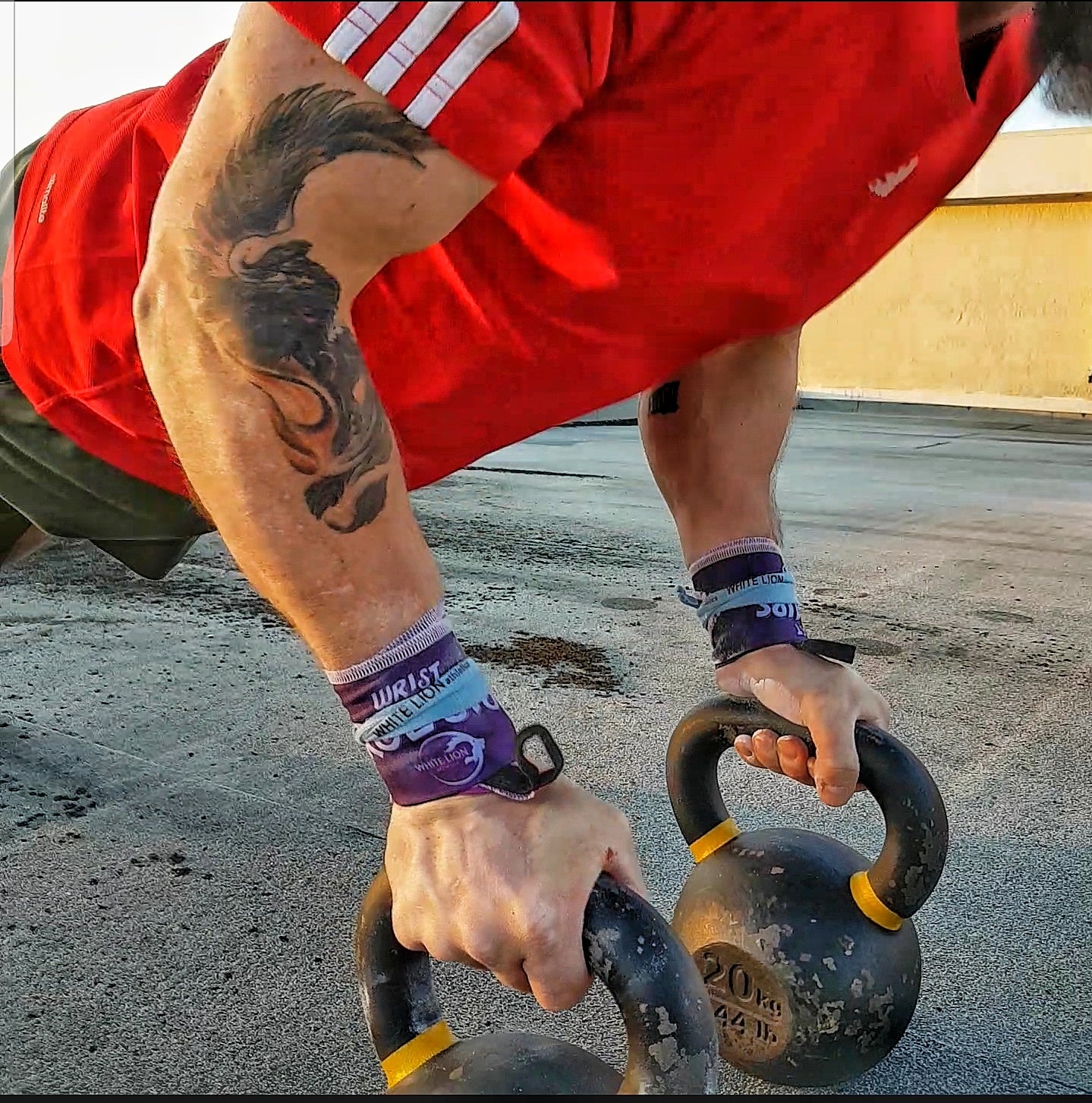 White Lion Athletics Strength Wraps used in kettlebell training