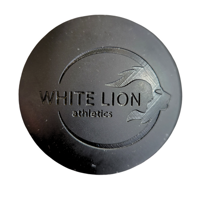 Black lacrosse ball for self-massage and myofascial release. White Lion Athletics