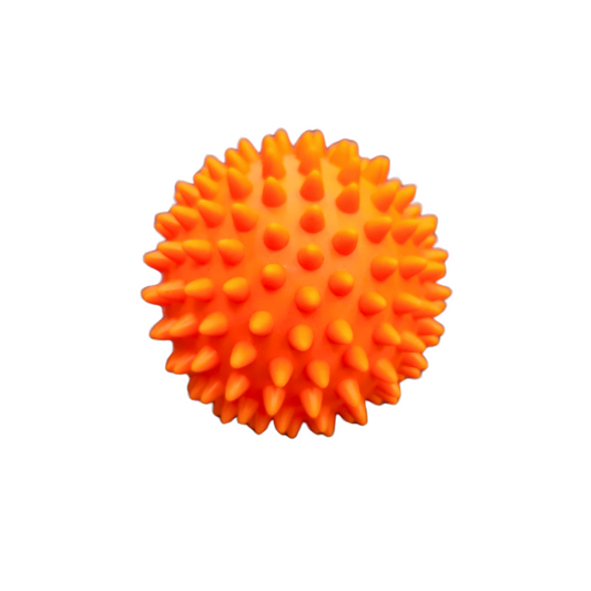 Orange colored, soft spiky massage ball by White Lion Athletics.