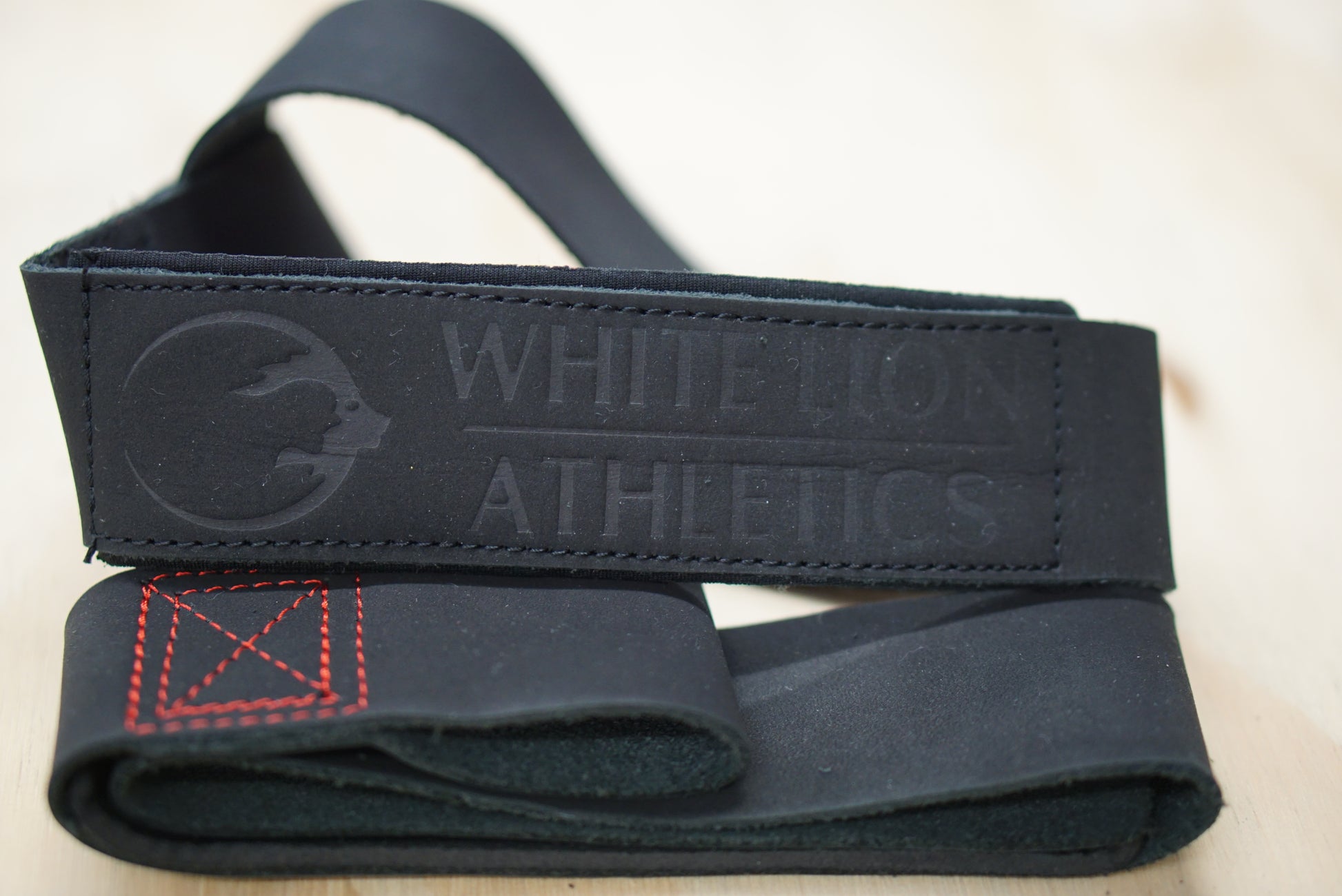 Black leather Weightlifting strapswith Neoprene Wrist Padding by White Lion Athletics